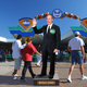 An animatronic Michael Eisner greets visitors outside the entrance to the Whirly Merge.